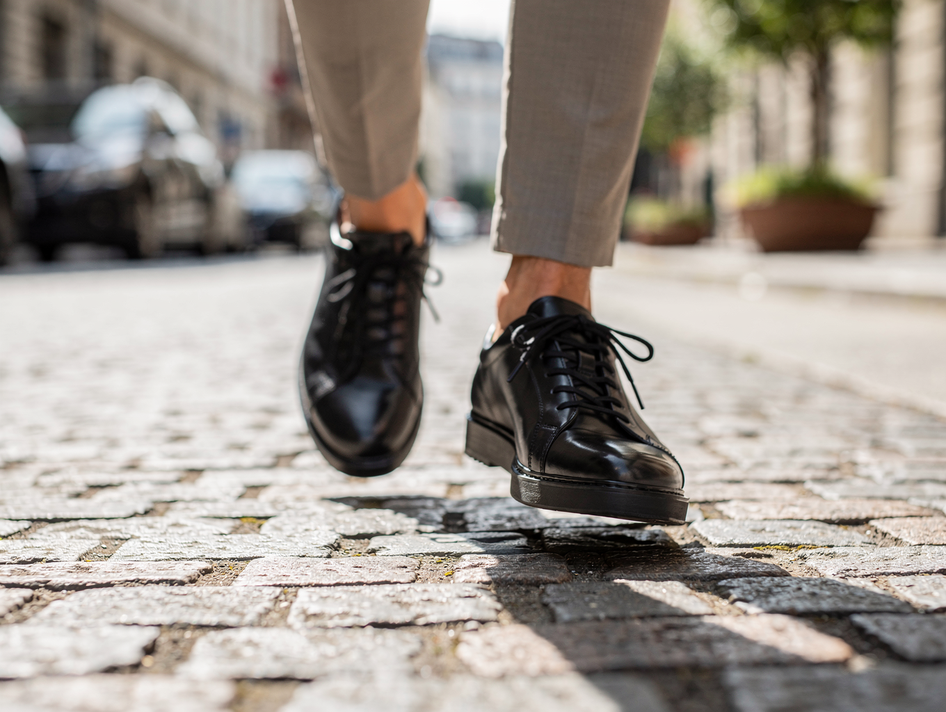 Elena wearing her new leather sneakers in the city